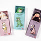 Little Peeps Danny Dinosaur Matchbox Doll