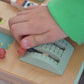 Video of a child playing with the Tenderleaf Toys Space Station Busy Board